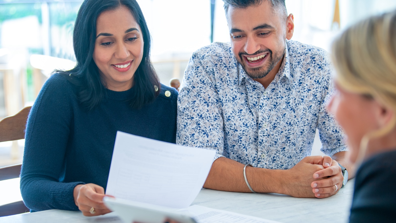 Couple reviewing life insurance options together